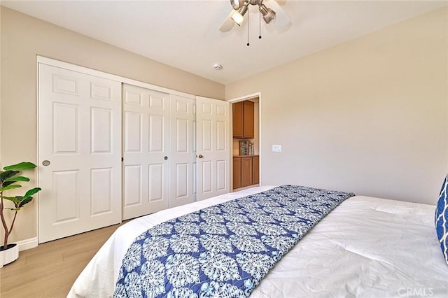 4224 Castlepeak Dr, Corona, CA 92883 - bedroom featuring light wood finished floors, a closet, and a ceiling fan
