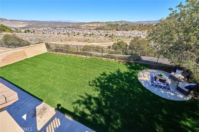 4224 Castlepeak Dr, Corona, CA 92883 - view of yard featuring a fenced backyard and a mountain view
