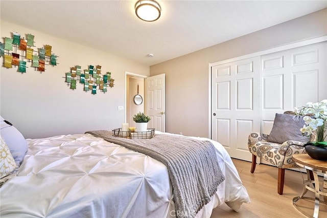 4224 Castlepeak Dr, Corona, CA 92883 - bedroom featuring a closet and light wood-type flooring