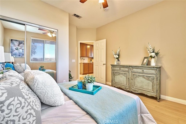 4224 Castlepeak Dr, Corona, CA 92883 - bedroom with a ceiling fan, baseboards, light wood finished floors, and visible vents
