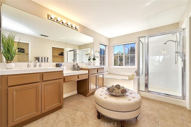 4224 Castlepeak Dr, Corona, CA 92883 - bathroom featuring a sink, a stall shower, visible vents, double vanity, and a bath