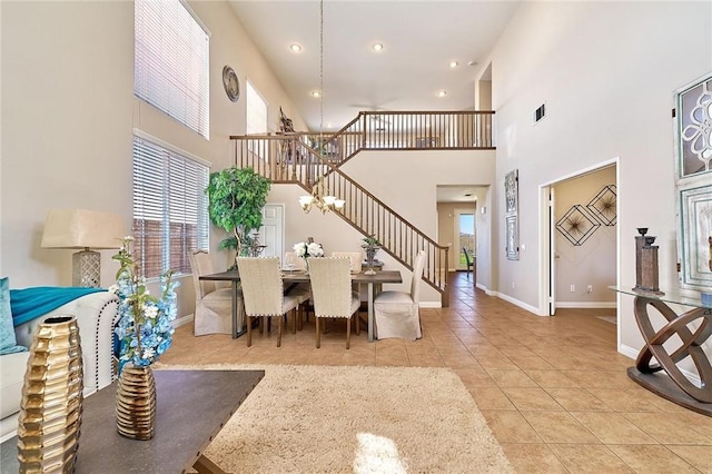4224 Castlepeak Dr, Corona, CA 92883 - dining space featuring baseboards, tile patterned floors, recessed lighting, stairway, and a high ceiling