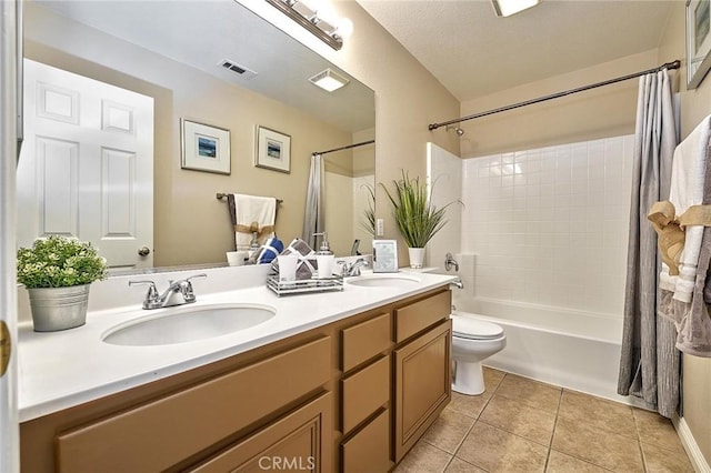 4224 Castlepeak Dr, Corona, CA 92883 - full bathroom with toilet, a sink, tile patterned flooring, visible vents, and shower / bath combination with curtain