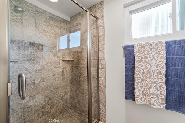 bathroom featuring a stall shower