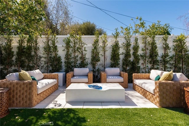 view of patio / terrace with a fenced backyard and an outdoor hangout area