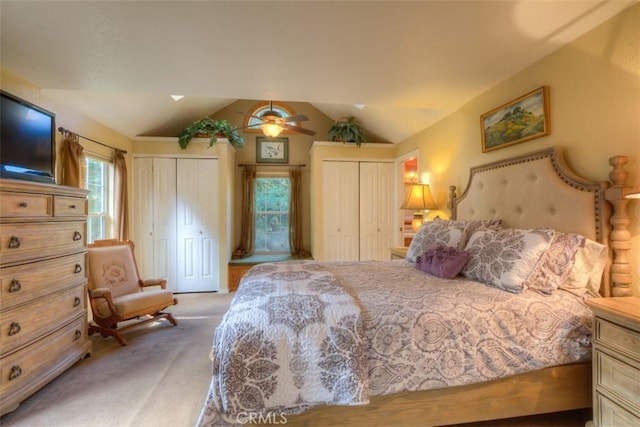 13730 Nimshew Rd, Magalia, CA 95954 - bedroom featuring a ceiling fan, vaulted ceiling, light colored carpet, and multiple closets
