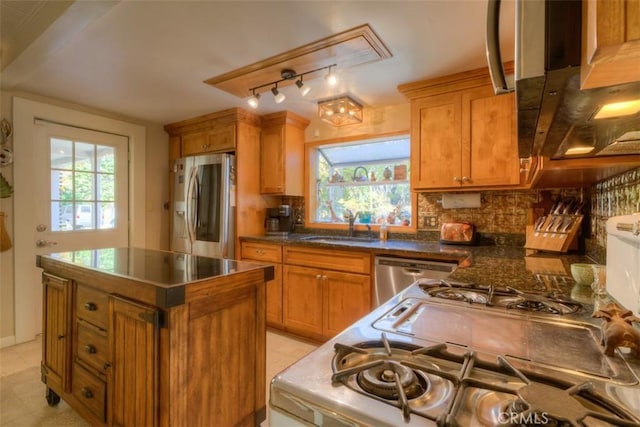 13730 Nimshew Rd, Magalia, CA 95954 - kitchen with a sink, tasteful backsplash, appliances with stainless steel finishes, and a healthy amount of sunlight
