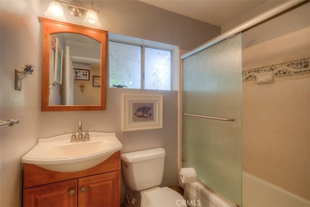 13730 Nimshew Rd, Magalia, CA 95954 - bathroom featuring enclosed tub / shower combo, toilet, and vanity