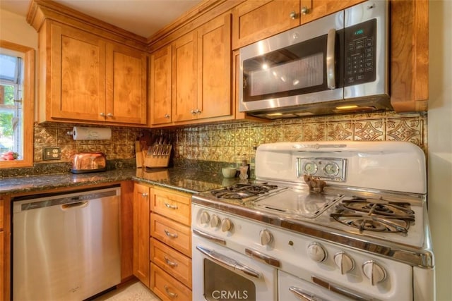 13730 Nimshew Rd, Magalia, CA 95954 - kitchen featuring decorative backsplash, brown cabinets, and stainless steel appliances
