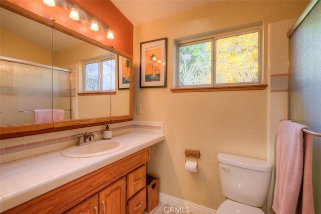 13730 Nimshew Rd, Magalia, CA 95954 - full bath featuring a wealth of natural light, an enclosed shower, toilet, and vanity