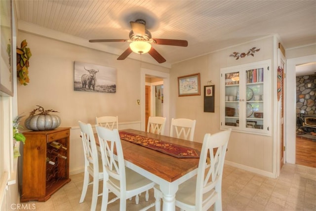 13730 Nimshew Rd, Magalia, CA 95954 - dining space with a wood stove and ceiling fan