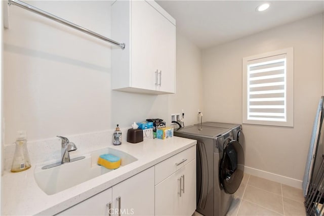121 Mulberry, Lake Forest, CA 92630 - laundry area with cabinet space, washing machine and dryer, recessed lighting, and light tile patterned floors