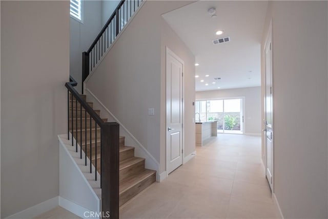 121 Mulberry, Lake Forest, CA 92630 - staircase featuring baseboards and recessed lighting