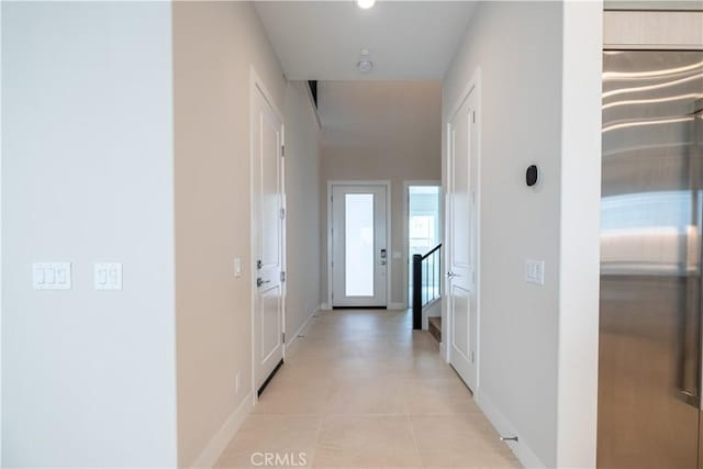 121 Mulberry, Lake Forest, CA 92630 - hallway featuring baseboards and light tile patterned flooring