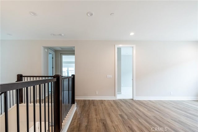 121 Mulberry, Lake Forest, CA 92630 - unfurnished room with light wood-style floors and recessed lighting