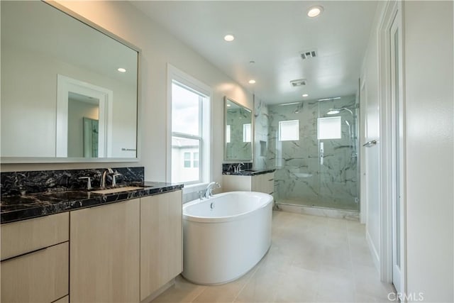 121 Mulberry, Lake Forest, CA 92630 - full bathroom featuring a marble finish shower, a soaking tub, vanity, and recessed lighting