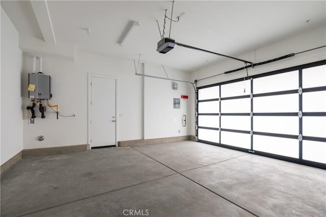 121 Mulberry, Lake Forest, CA 92630 - garage with a garage door opener and tankless water heater