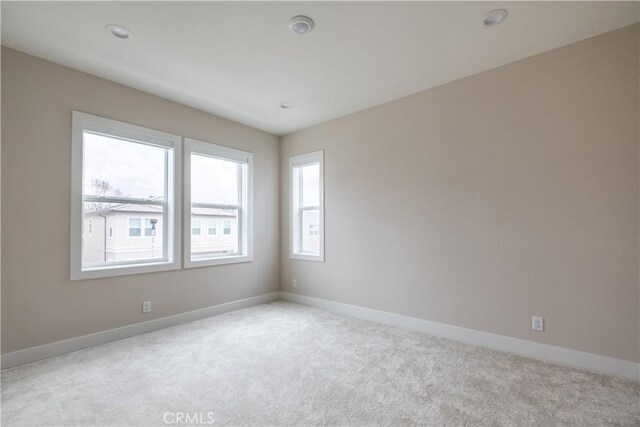 121 Mulberry, Lake Forest, CA 92630 - carpeted spare room with recessed lighting