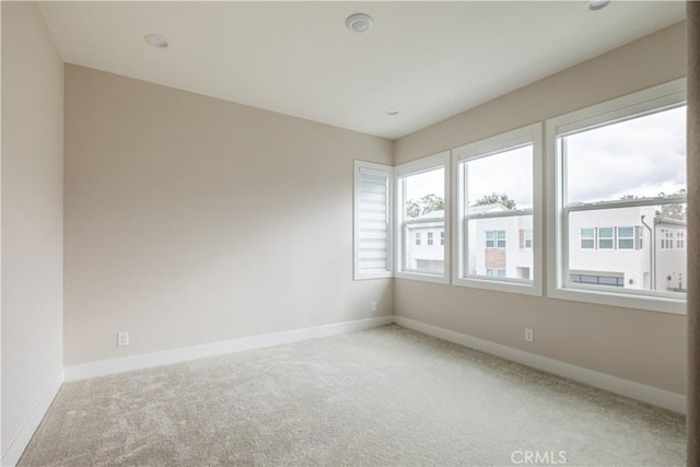 121 Mulberry, Lake Forest, CA 92630 - carpeted empty room with baseboards