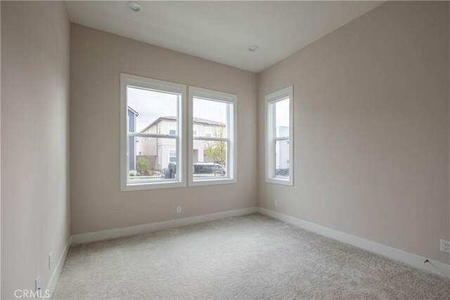121 Mulberry, Lake Forest, CA 92630 - carpeted empty room featuring healthy amount of natural light
