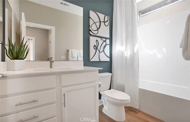 29754 Laurel Ct, Menifee, CA 92584 - bathroom with visible vents, toilet, shower / bath combo, wood finished floors, and vanity