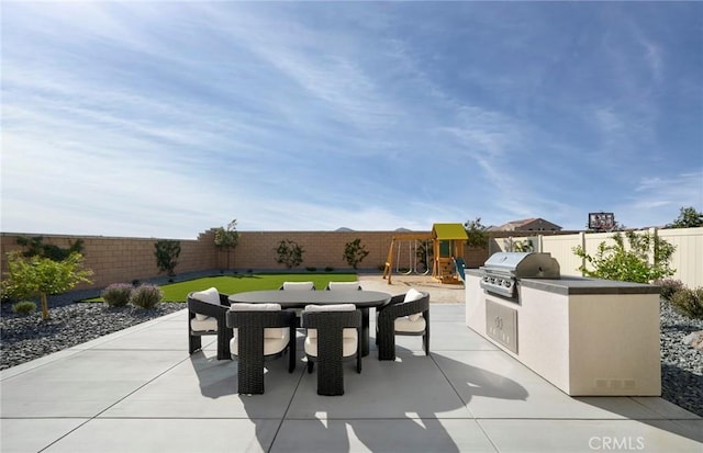 29754 Laurel Ct, Menifee, CA 92584 - fenced backyard featuring outdoor dining space, a patio area, area for grilling, and a playground