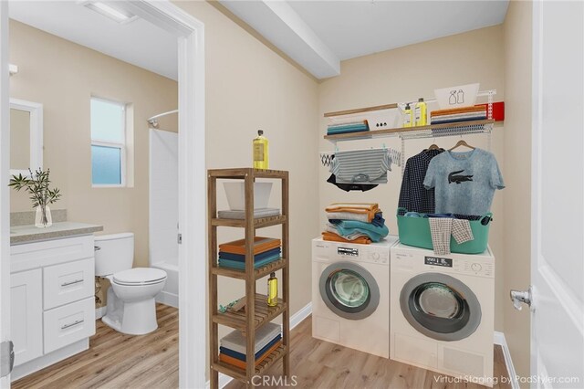 1109 N Mulberry, Compton, CA 90222 - laundry area featuring separate washer and dryer and light wood-style flooring