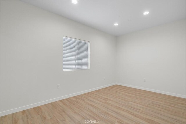 1109 N Mulberry, Compton, CA 90222 - empty room with light wood-type flooring and recessed lighting