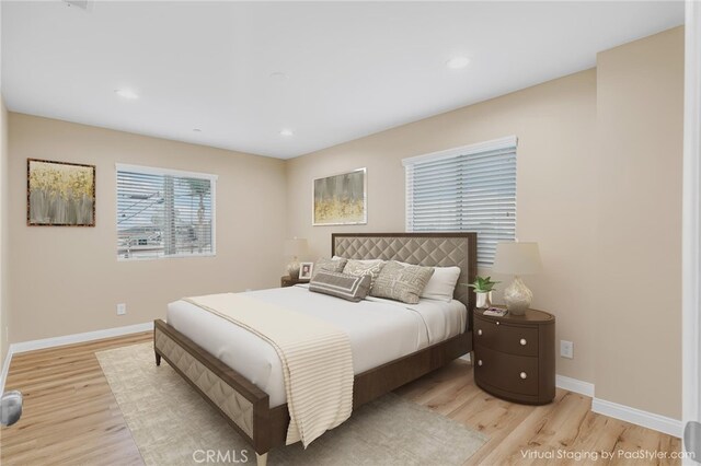1109 N Mulberry, Compton, CA 90222 - bedroom with light wood finished floors and recessed lighting