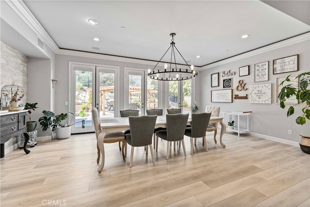 3905 Elderberry Cir, Corona, CA 92882 - dining room with an inviting chandelier, light wood-style flooring, ornamental molding, and a healthy amount of sunlight