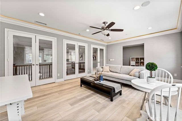 3905 Elderberry Cir, Corona, CA 92882 - living area featuring french doors, light wood-type flooring, ceiling fan, and visible vents
