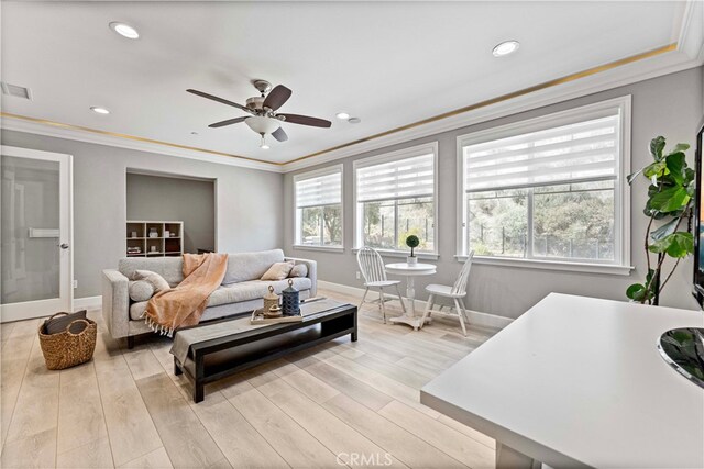 3905 Elderberry Cir, Corona, CA 92882 - living area featuring a wealth of natural light, crown molding, light wood-style flooring, and a ceiling fan