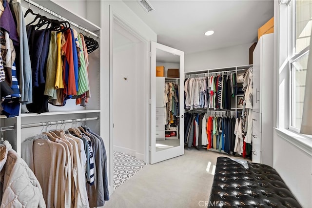 3905 Elderberry Cir, Corona, CA 92882 - walk in closet featuring carpet floors and visible vents