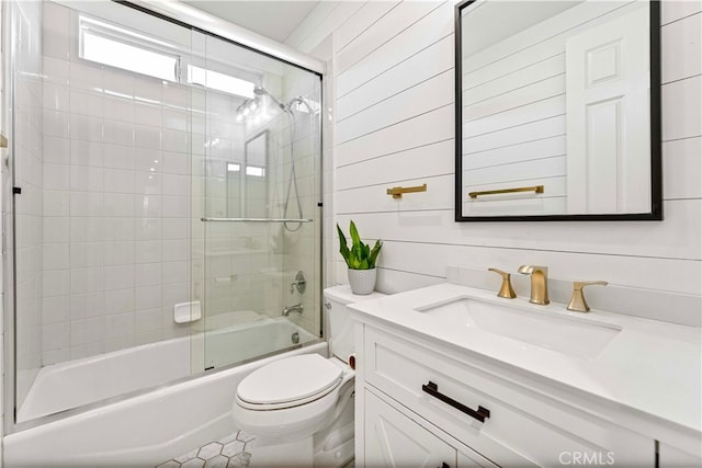 3905 Elderberry Cir, Corona, CA 92882 - full bathroom featuring toilet, vanity, shower / bath combination with glass door, and wooden walls