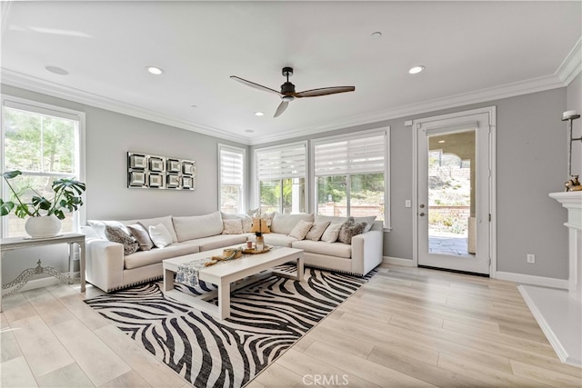 3905 Elderberry Cir, Corona, CA 92882 - living room with crown molding, light wood-type flooring, baseboards, ceiling fan, and recessed lighting