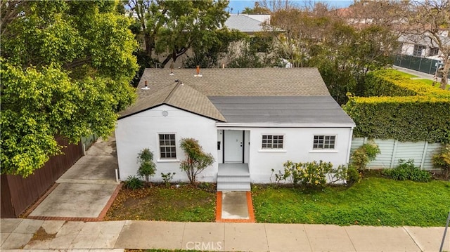 7116 Waring Ave, Los Angeles, CA 90046 - view of front of home with a front lawn, fence, and stucco siding