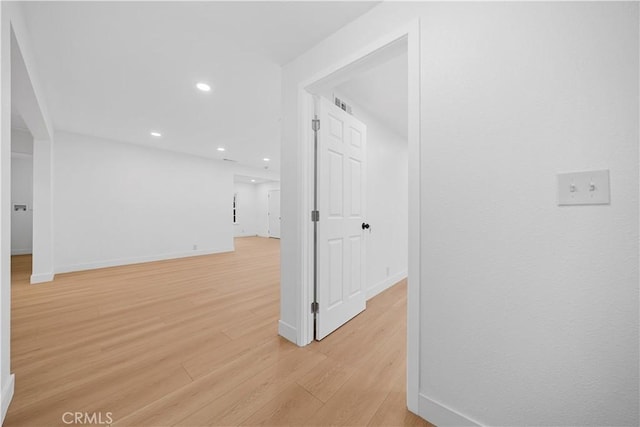 7116 Waring Ave, Los Angeles, CA 90046 - corridor featuring visible vents, recessed lighting, baseboards, and light wood-style floors