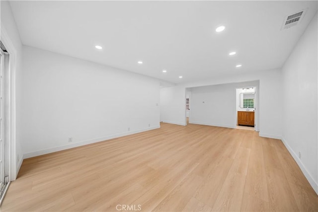 7116 Waring Ave, Los Angeles, CA 90046 - spare room featuring recessed lighting, visible vents, light wood-style flooring, and baseboards