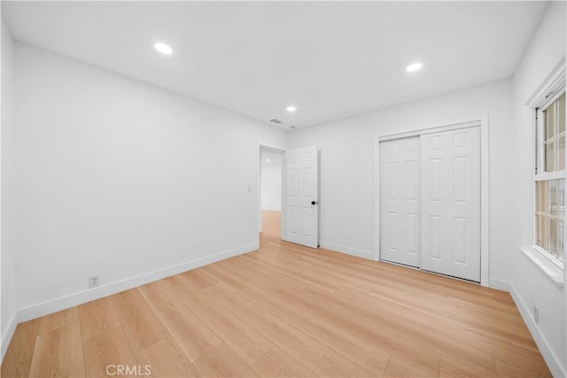 7116 Waring Ave, Los Angeles, CA 90046 - unfurnished bedroom featuring a closet, recessed lighting, light wood-style flooring, and baseboards