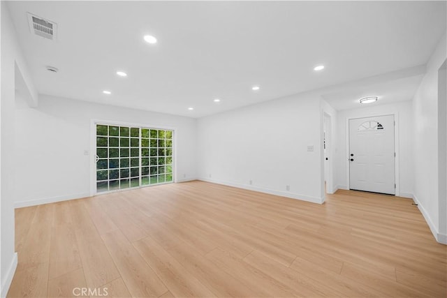 7116 Waring Ave, Los Angeles, CA 90046 - spare room with light wood finished floors, visible vents, recessed lighting, and baseboards
