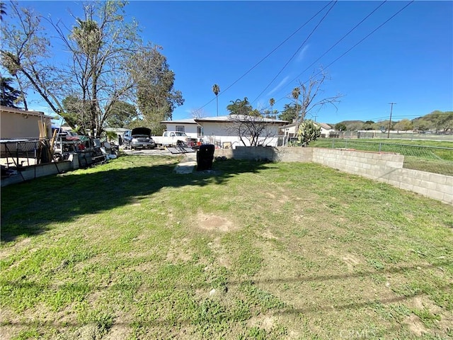 view of yard featuring fence