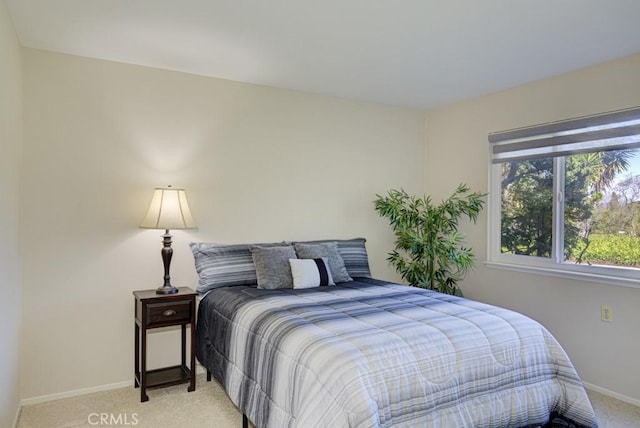 5 Via Castilla Unit B, Laguna Woods, CA 92637 - bedroom featuring light carpet and baseboards