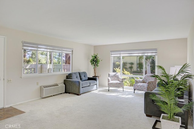 5 Via Castilla Unit B, Laguna Woods, CA 92637 - living area featuring healthy amount of natural light, a wall unit AC, and carpet