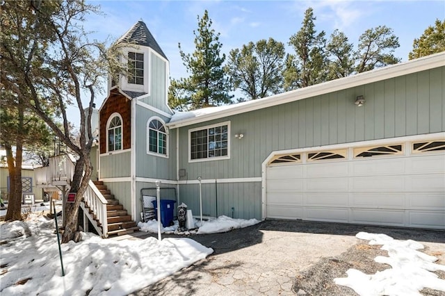 252 Riverside Ave, Sugarloaf, CA 92386 - exterior space with aphalt driveway, a garage, and stairway