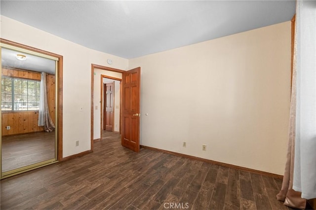 252 Riverside Ave, Sugarloaf, CA 92386 - unfurnished bedroom with dark wood-type flooring and baseboards