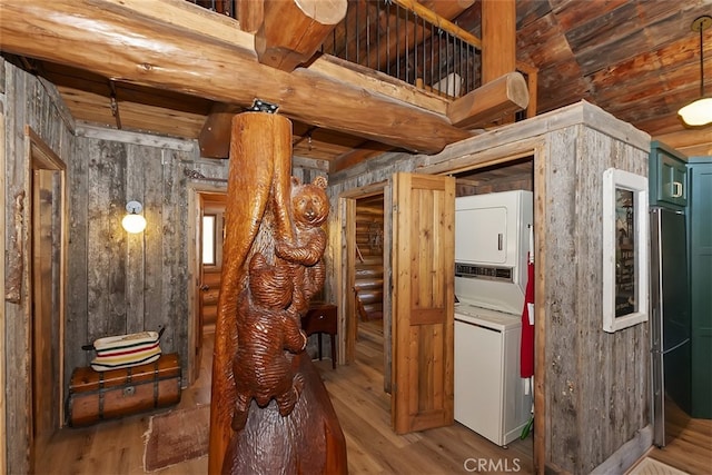 29632 Hook Creek Rd, Cedar Glen, CA 92321 - hallway featuring stacked washer and clothes dryer and wood finished floors