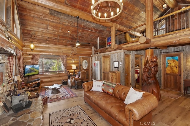 29632 Hook Creek Rd, Cedar Glen, CA 92321 - living room featuring high vaulted ceiling, wood-type flooring, a chandelier, log walls, and beamed ceiling