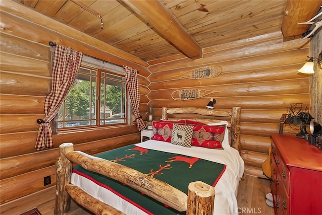 29632 Hook Creek Rd, Cedar Glen, CA 92321 - bedroom with a wood ceiling with exposed beams, hardwood / wood-style floors, and rustic walls