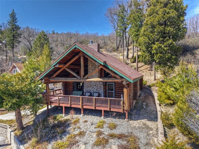 29632 Hook Creek Rd, Cedar Glen, CA 92321 - cabin with log exterior, a chimney, and a deck