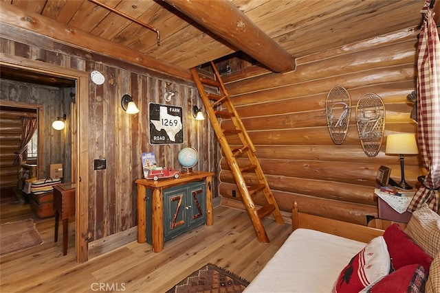 29632 Hook Creek Rd, Cedar Glen, CA 92321 - bedroom featuring a wood ceiling with exposed beams, hardwood / wood-style flooring, and rustic walls